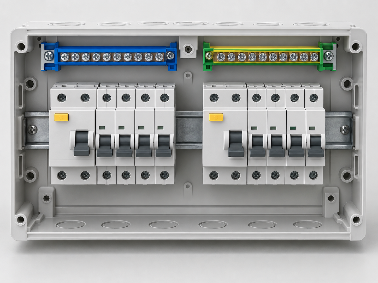 DIN-rail distribution enclosure with residual-current and overcurrent modules, test buttons and separate neutral and protective-earth terminal strips
